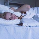 A girl sleeping on bed